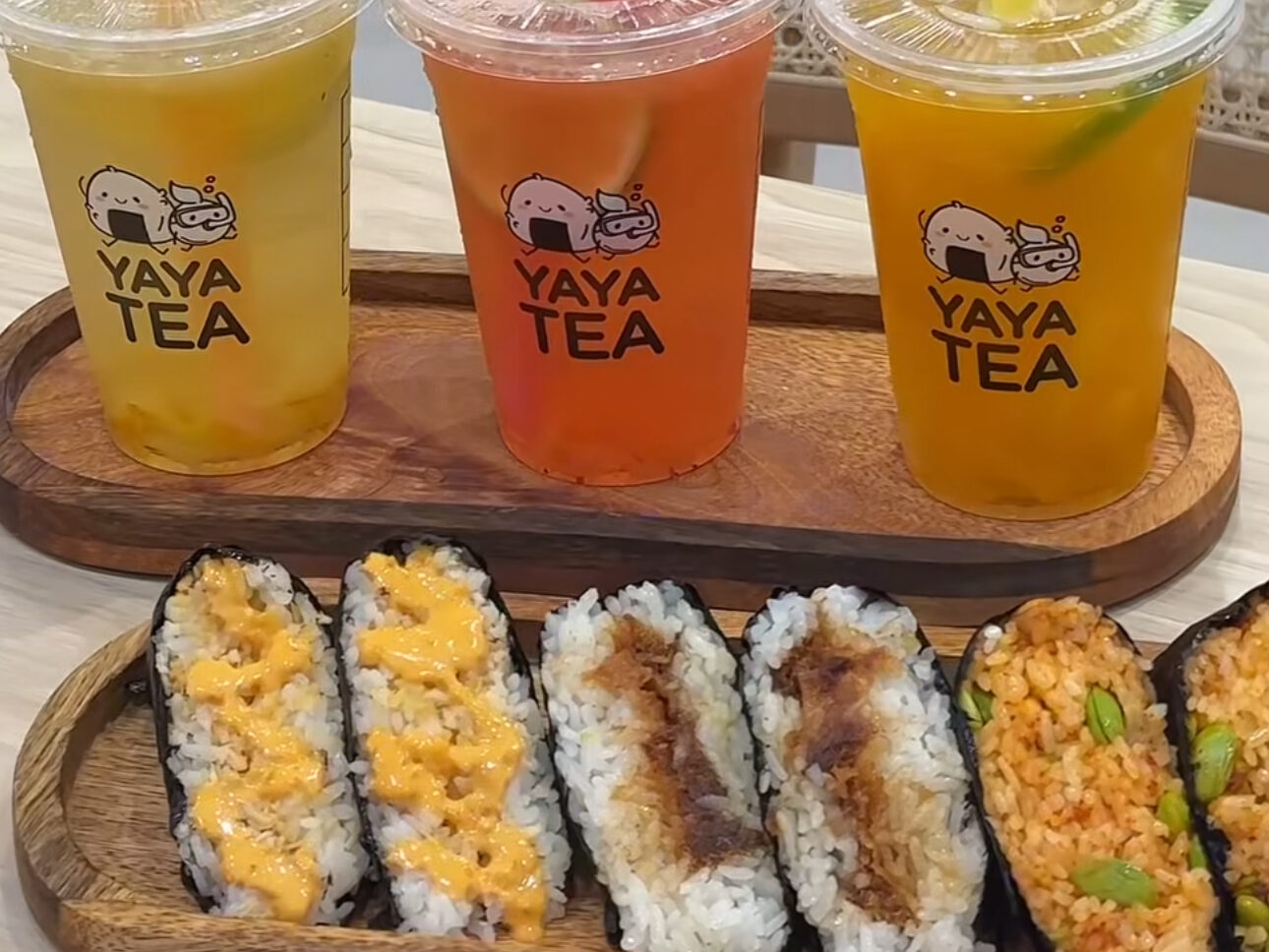 Bubble tea served with handmade onigiri at Yaya Tea.