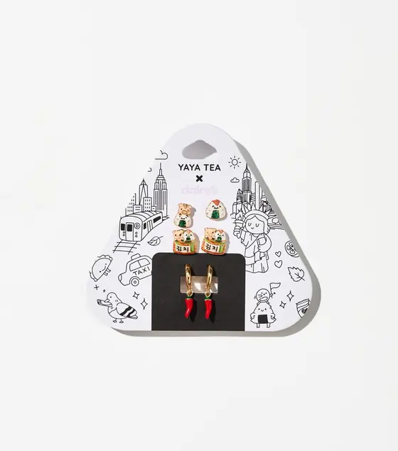 Yaya Tea x Claire's earring trio: pig and onigiri studs, kimchi jar studs, and chili pepper hoops